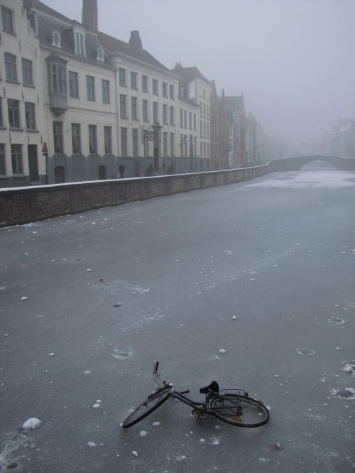 bruges frozen canal bicycle 500x666
