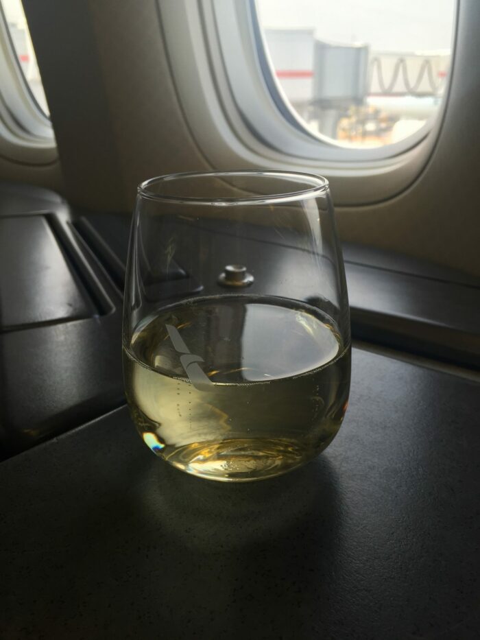 american airlines first class champagne 700x933