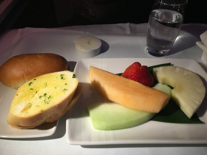cathay pacific business class fruit garlic bread 700x525