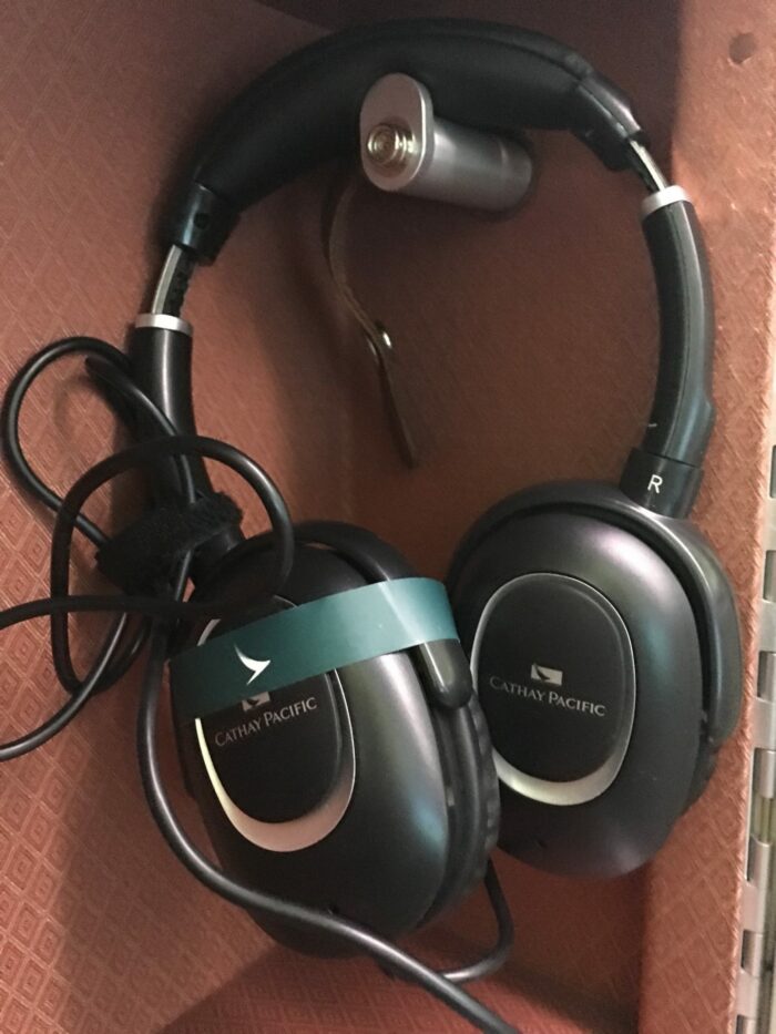 cathay pacific business class headphones 700x933