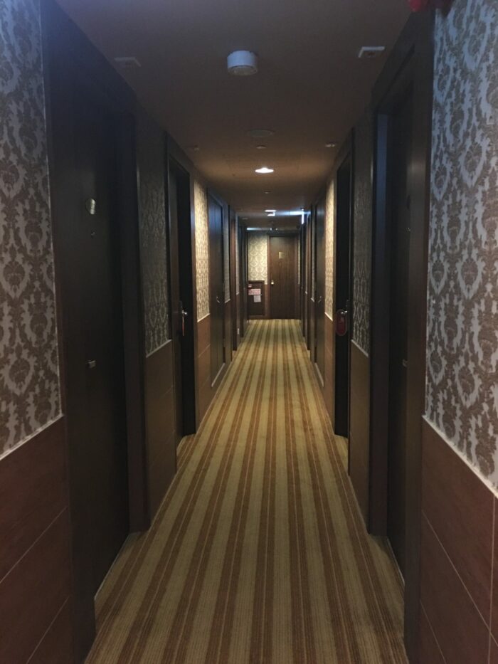 grand city hotel hong kong hallway 700x933