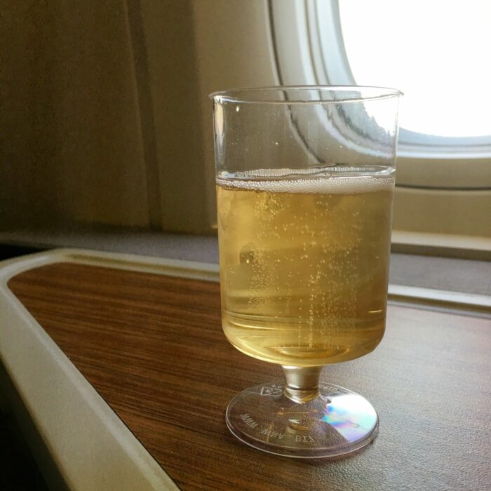 american airlines business class boeing 777 300er los angeles lax to london heathrow lhr champagne 700x700