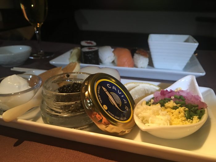 japan airlines boeing 777 300er first class san francisco sfo tokyo haneda hnd caviar sushi 700x525