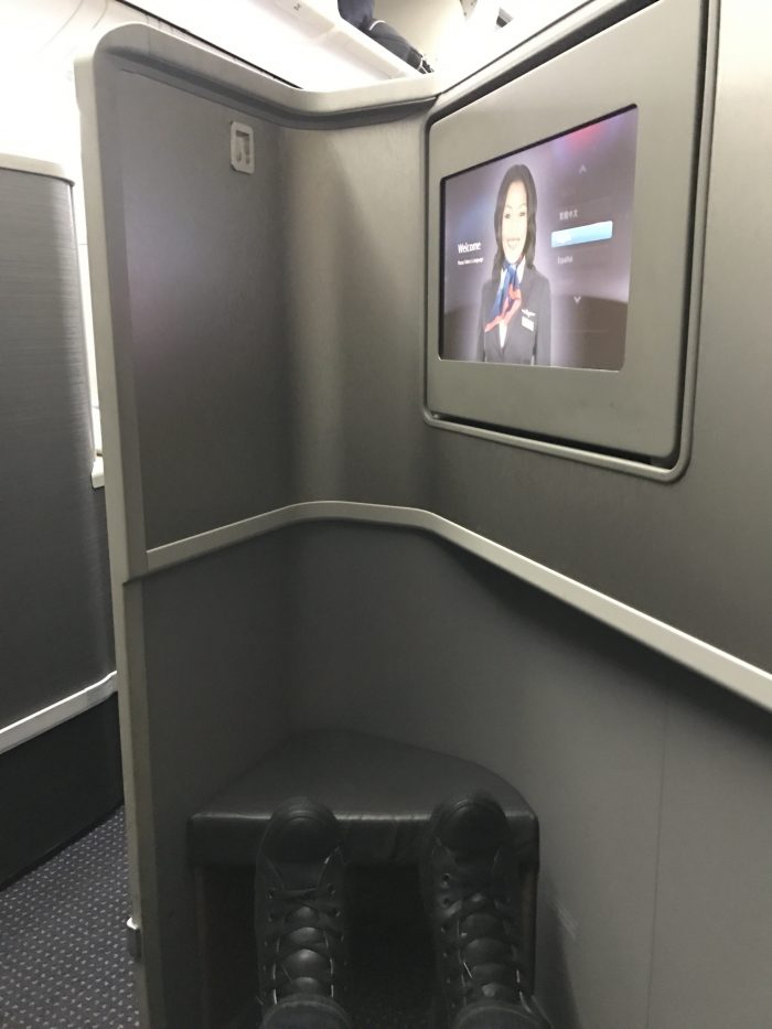 american airlines business class boeing 777 200 los angeles to london heathrow screen legroom 700x933
