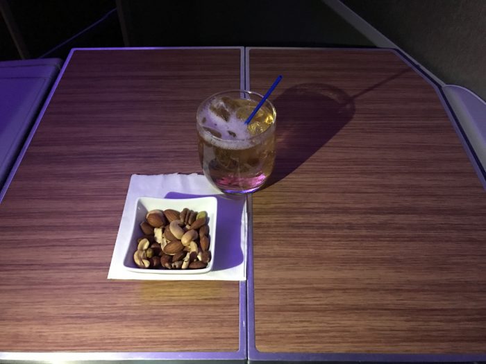 american airlines business class boeing 777 200 los angeles to london heathrow warm nuts cocktail 700x525