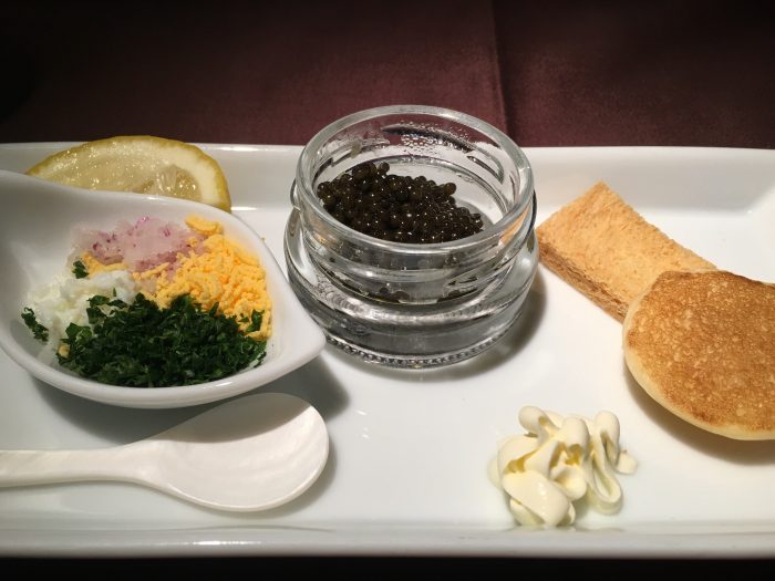 jal first class boeing 777 300er tokyo haneda hnd to san francisco sfo caviar breakfast 700x525