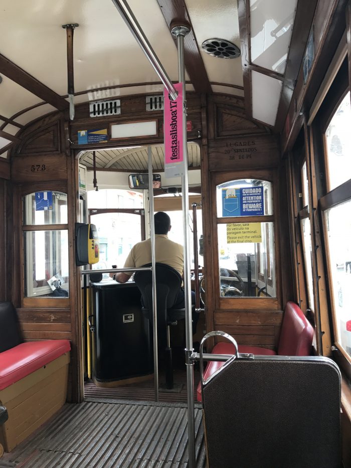 tram driver lisbon 700x933