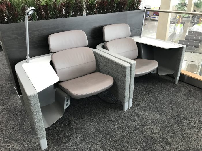 aspire lounge transborder departures calgary airport yyc chairs 700x525