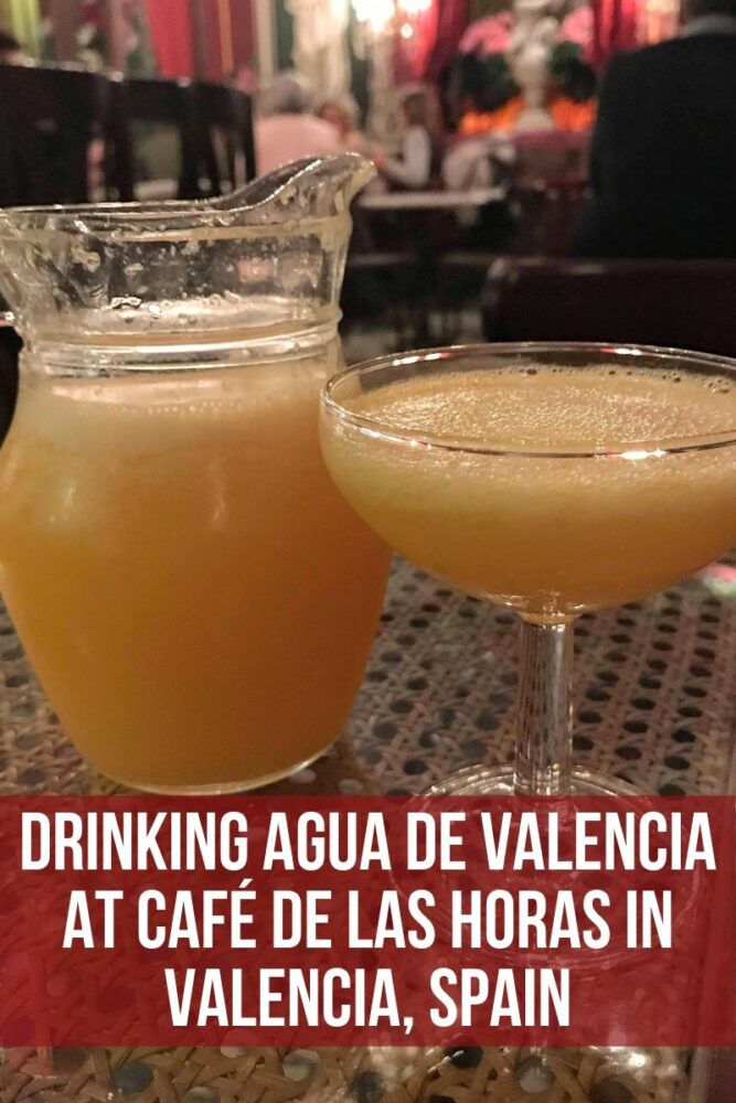 drinking agua de valencia at cafe de las horas in valencia spain 667x1000
