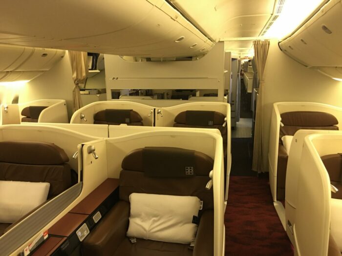 jal first class boeing 777 300er tokyo haneda hnd to san francisco sfo first class cabin scaled 700x525