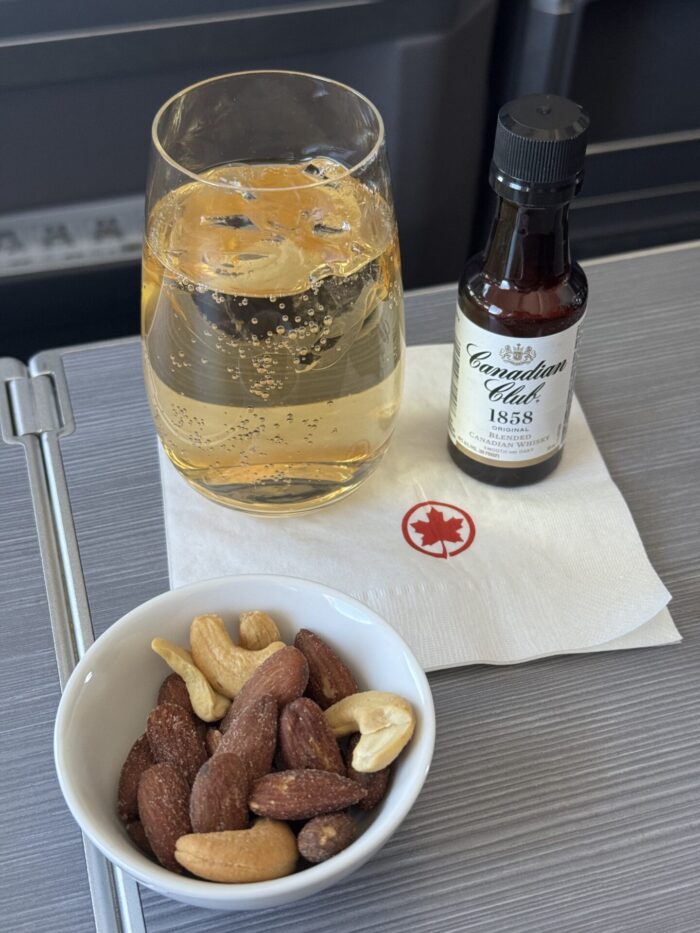 air canada business class warm nuts drink service 700x933