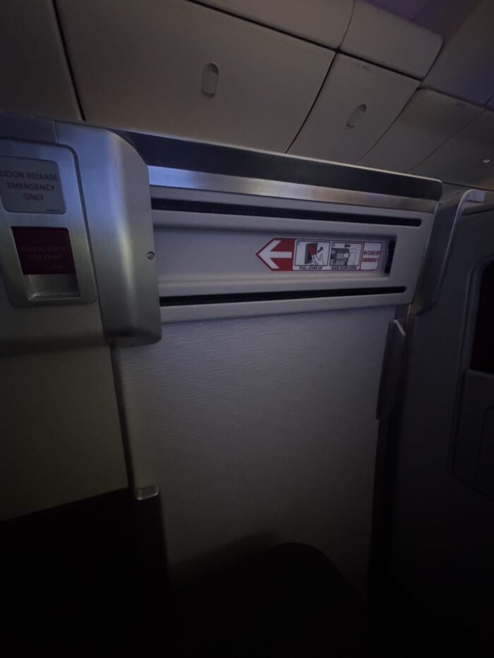 american airlines flagship suite closed door inside 700x933
