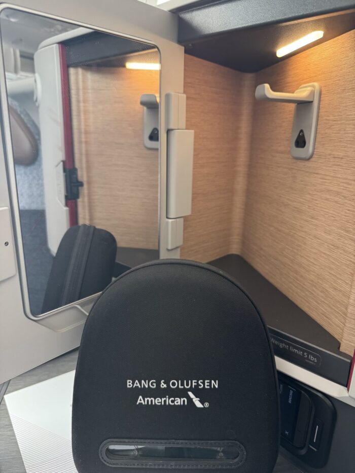 american airlines flagship suite headphones storage 700x933