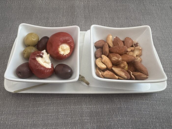 american airlines flagship suite nuts olives 700x525